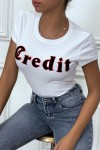 White t-shirt with 3D CREDIT writing.