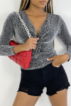 Sparkling top with silver leopard prints with long sleeves, v-neck.