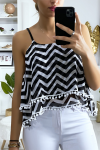 Tank top with black and white pattern in the shape of a zigzag with ruffle and mini pompom