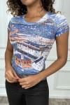 Navy t-shirt with design and rhinestones.
