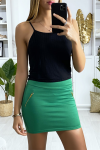 Very sexy green mini skirt with golden zip.