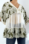 Bohemian-style openwork khaki tunic with pompoms and patterns.