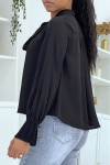 Fluid black blouse with long sleeves
