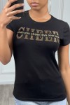 Black t-shirt with golden writing