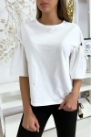 White top with puff sleeve with lace up and stripped.