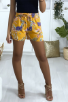 Mustard floral cotton shorts with pockets.