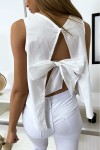 White backless top with women's bow to wear for all occasions.