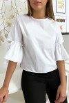 Women's summer blouse with flying sleeves and bow.