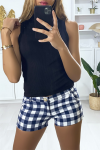 Blue and white checkered shorts with pockets.