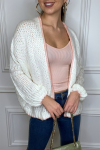 Fluffy white cardigan with pink outline in cable knit
