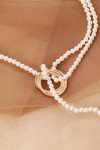 Asymmetrical pearl necklace