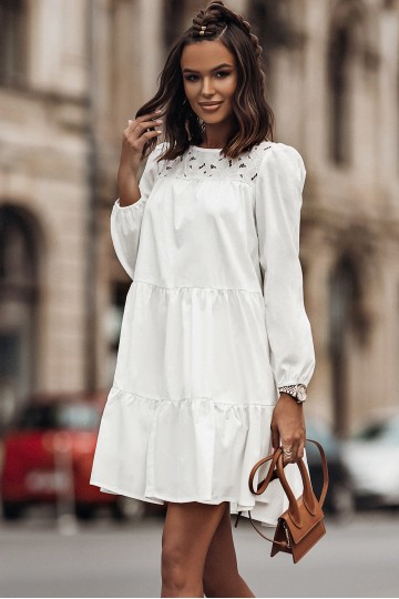Vestido blanco con escote de encajees