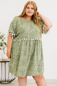 Plus size green dress with white pattern