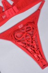 Red lingerie set with pompoms