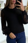 Black sweater with fine twisted knit and satin tulle sleeves