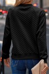 Black textured sweater