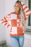 orange patterned sweater