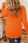Pull en crochet orange
