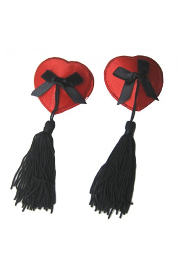Red heart-shaped nipple covers with black bows and pompoms