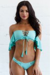 Light blue swimsuit with small sleeves and laceslacets