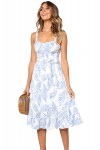 Mid-length white and blue dress with feather pattern.