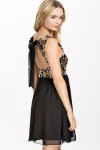 Robe patineuse noire & sequin or