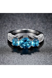 Three Blue Solitaire Ring