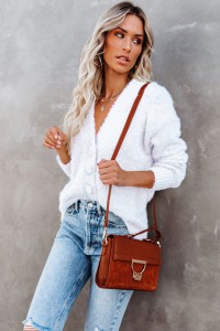 White buttoned sweater