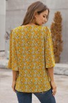 Mustard blouse with floral print