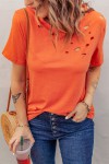 Orange t-shirt with a hole