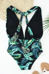 Black 1-piece swimsuit with tropical pattern