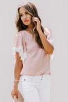 Pink top with lace sleeves
